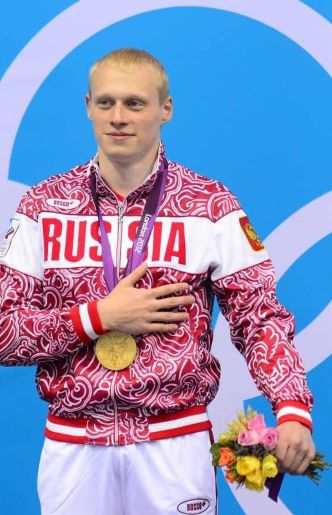 Илья на пьедестале Олимпиады после победы