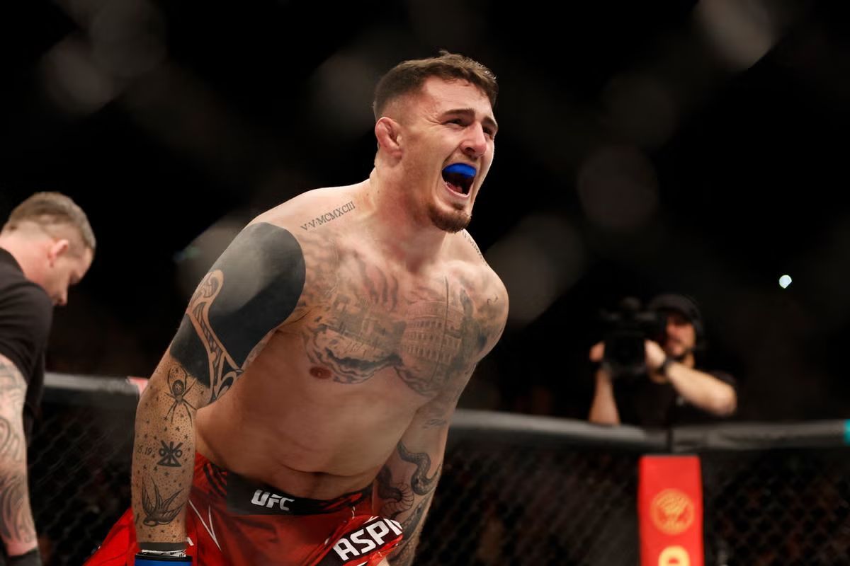 Том Аспиналл