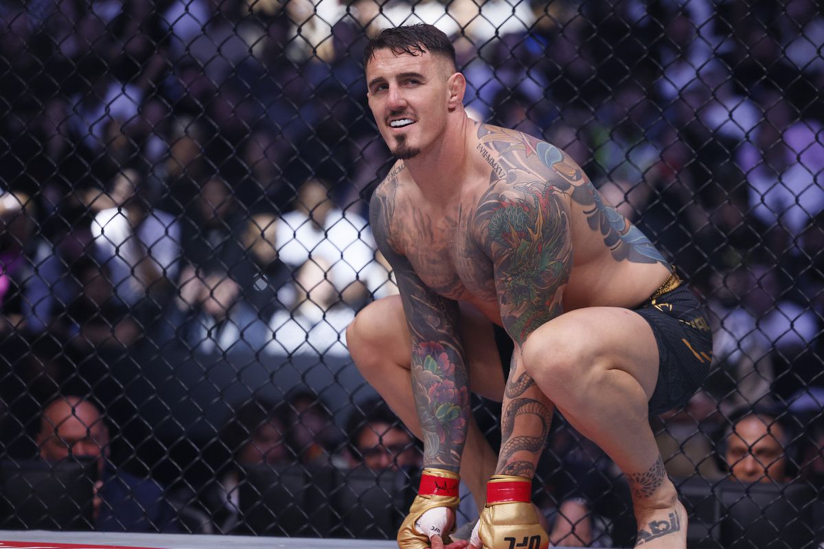 Том Аспиналл