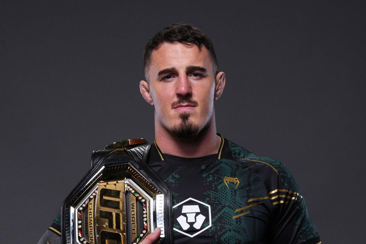 Том Аспиналл