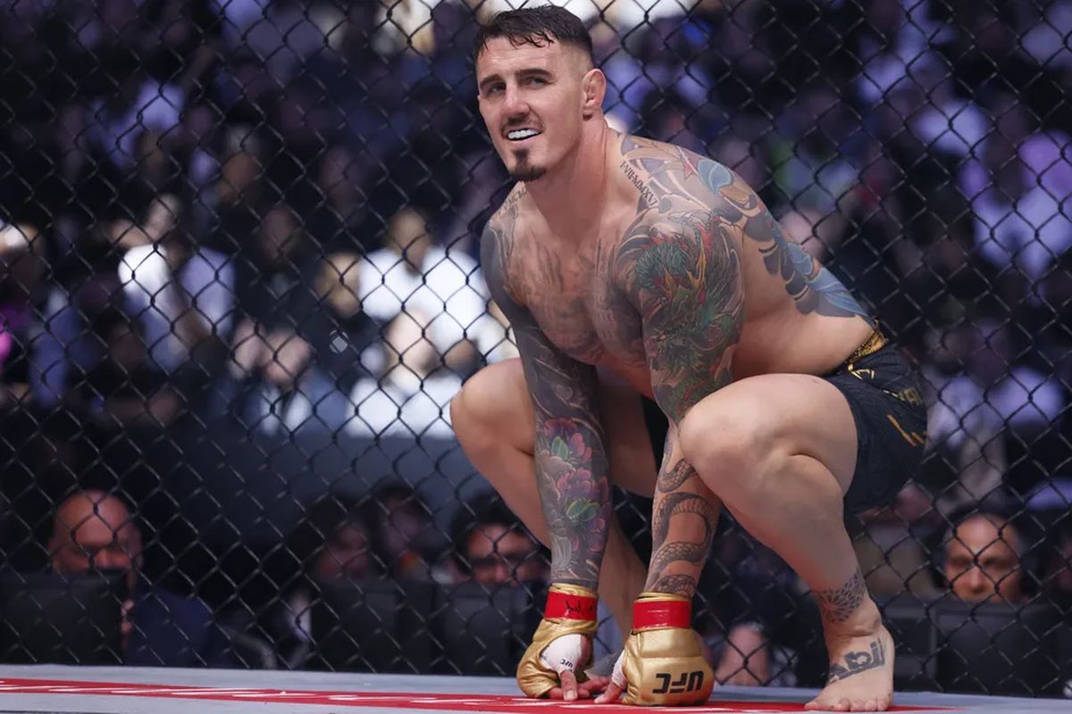 Том Аспиналл