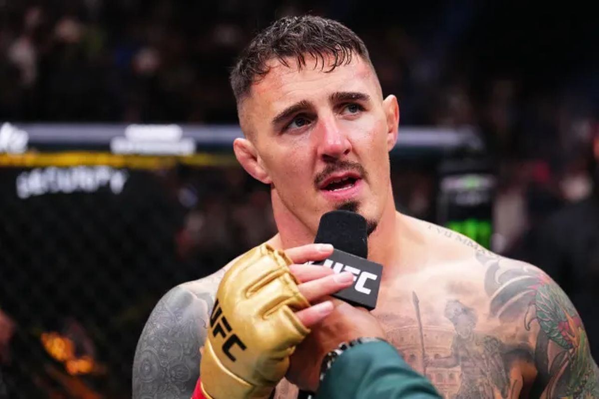 Том Аспиналл