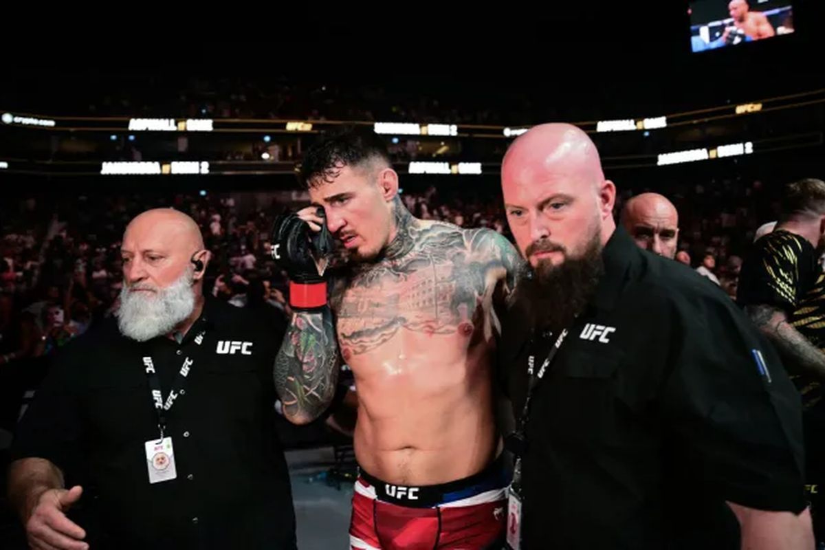 Том Аспиналл