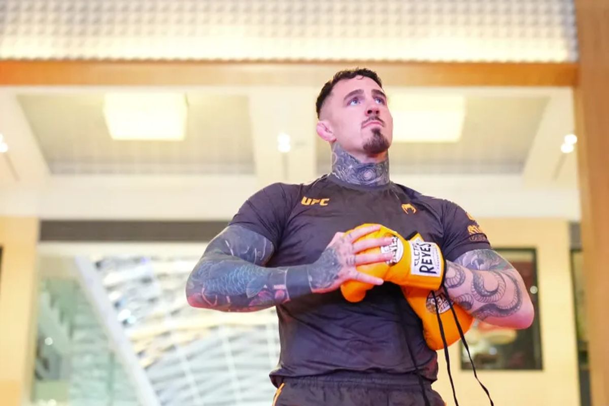 Том Аспиналл